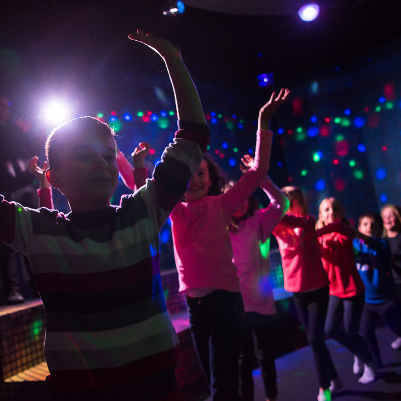 Children dancing to disco music