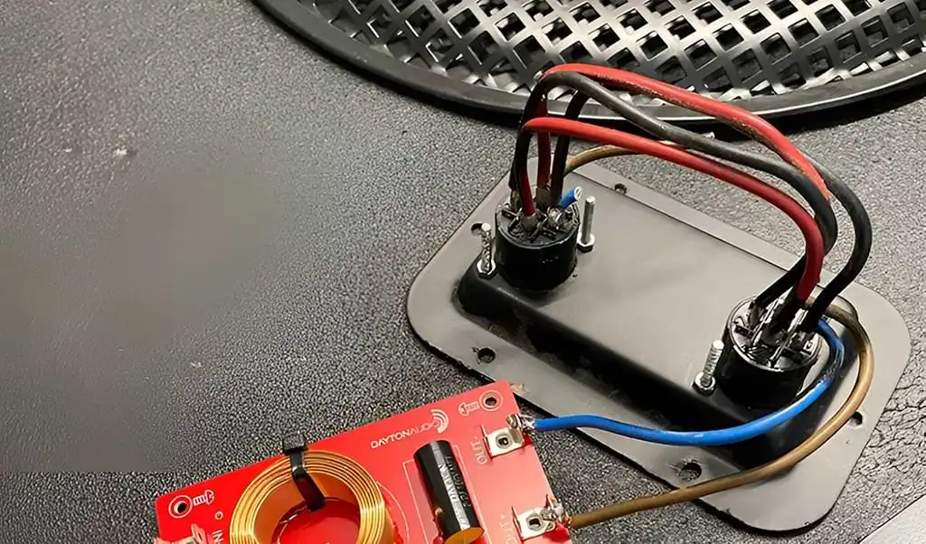 Crossover soldered to speaker connections