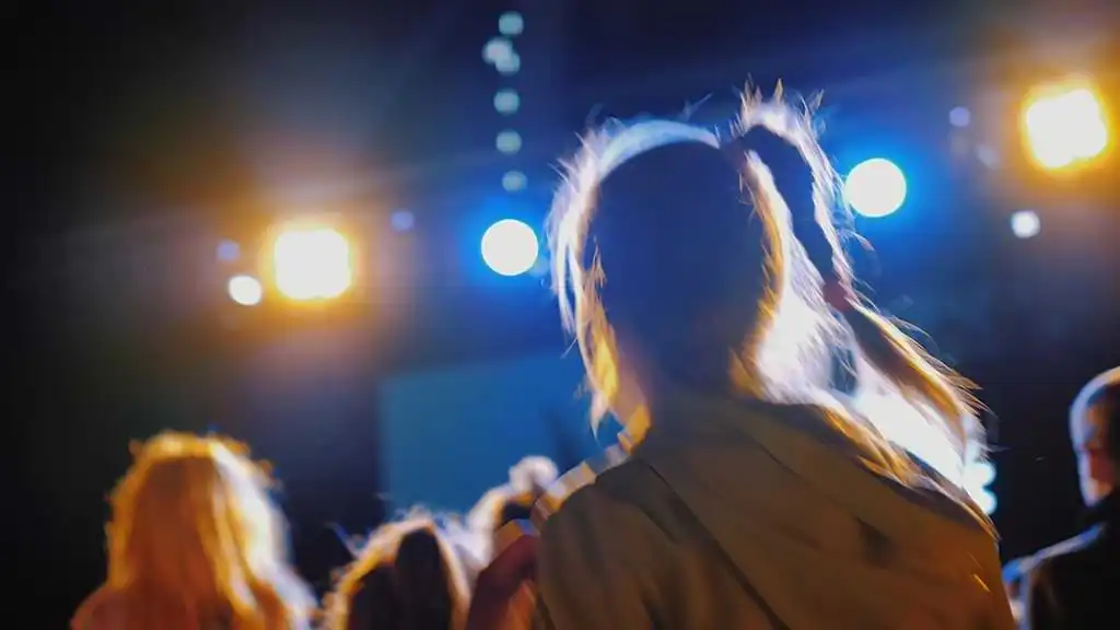 Girl dancing at a school disco