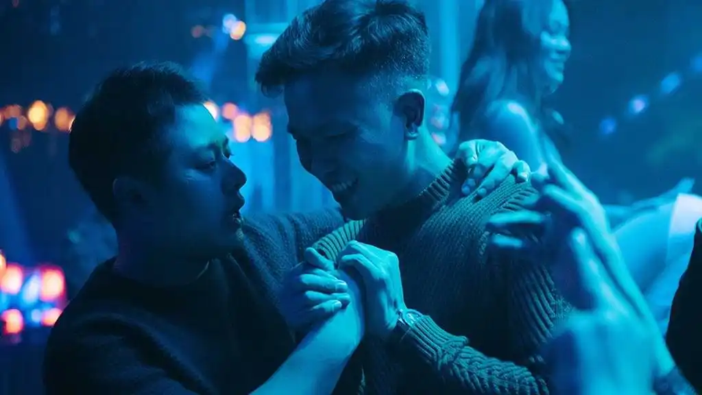 Two teenage boys have a 'Bro' moment