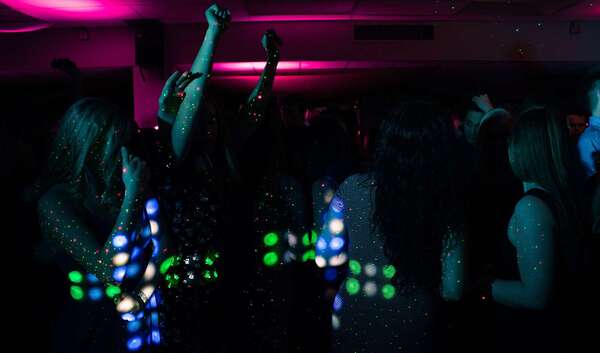 Adult birthday party celebration Adult birthday disco with guests dancing